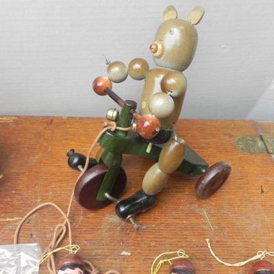 LOT 251  PUPPETS, MUSIC BOX AND BEAR RIDING A TRICYCLE