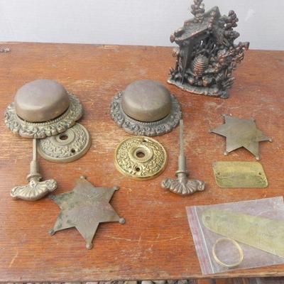 LOT 247  TWO DOOR RINGERS,COIN BANK AND BRASS BADGES