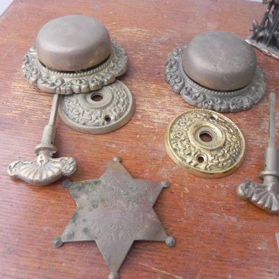 LOT 247  TWO DOOR RINGERS,COIN BANK AND BRASS BADGES