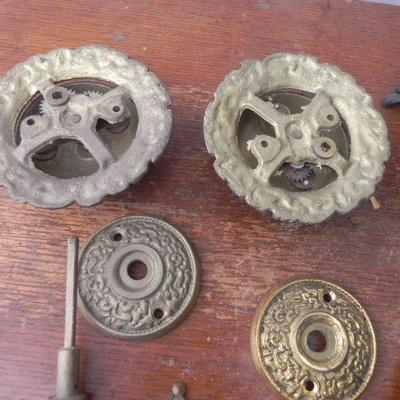 LOT 247  TWO DOOR RINGERS,COIN BANK AND BRASS BADGES