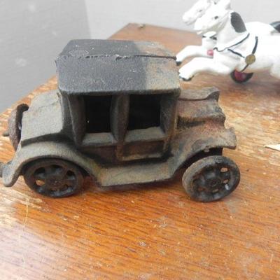 LOT 242  CAST IRON TOY STAGECOACH, FIRE TRUCK & CAR