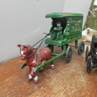 LOT 241  HORSE DRAWN CAST IRON TOYS