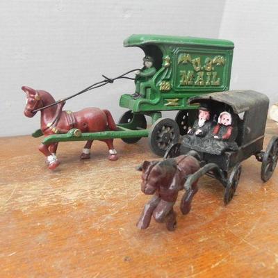 LOT 241  HORSE DRAWN CAST IRON TOYS