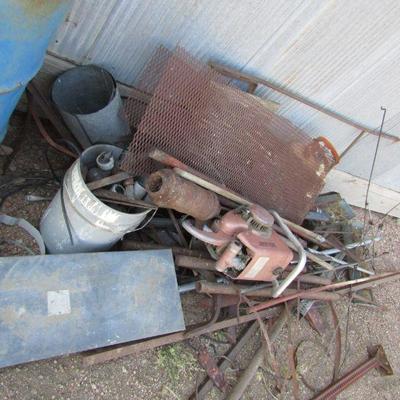 F-16  SCRAP PILE BY BIG BUILDING