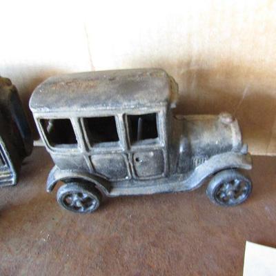 G-22  THREE CAST IRON VEHICLES