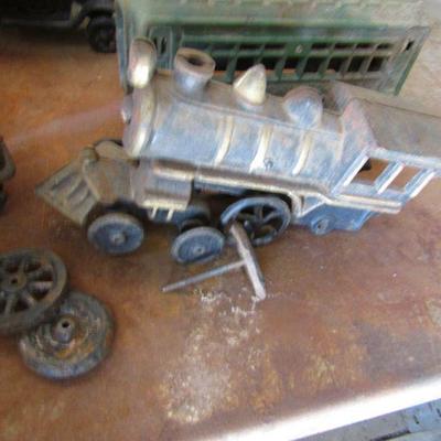 G-22  THREE CAST IRON VEHICLES