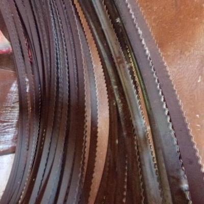 WS-54  LARGE BAND SAW BLADES AND NUT AND BOLT BINS