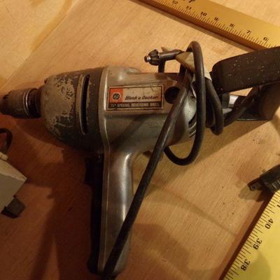 B-93  CORDED DRILL, ELECTRIC HEATER, METAL YARD STICK AND MORE