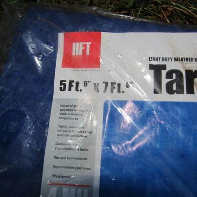 ES-14  NEW TARPS