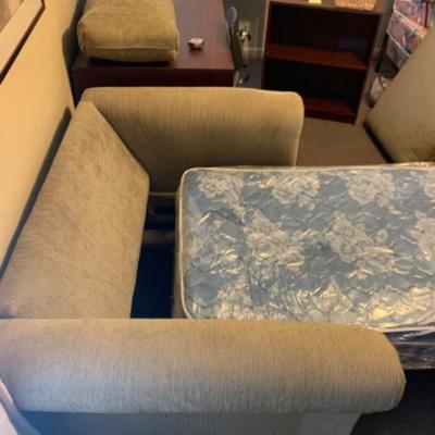 10. Love seat/hide-a-bed in unused pristine condition