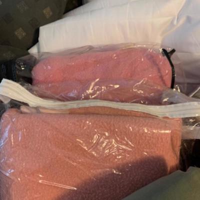 19. Bedding (two sets) of pillows, shams, duvet covers, comforters and blankets