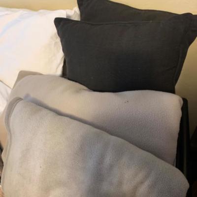 19. Bedding (two sets) of pillows, shams, duvet covers, comforters and blankets