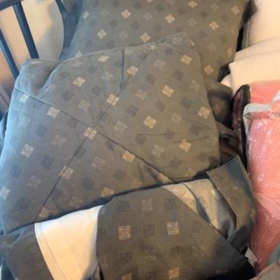 19. Bedding (two sets) of pillows, shams, duvet covers, comforters and blankets