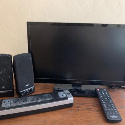 25. Flatscreen Insignia television (19-inch) with speakers and power cord