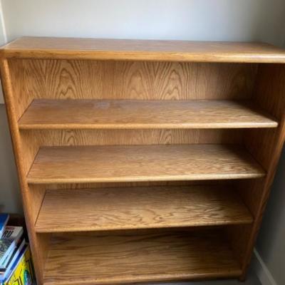 43. Oak bookcase (46â€x42â€x12.5â€)