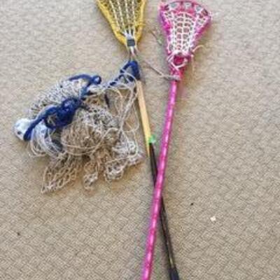 A 25 Lacross sticks and hammock