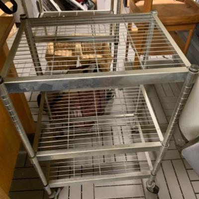 57. Pair of Metal  Rolling Shelves 
