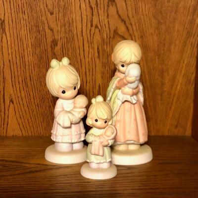 Precious Moments Figurines-- Holding Babies