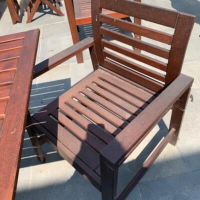 65.  Teak picnic table with four chairs (folded: 55”x30”x28.5”; leaves measure 23.5” each)