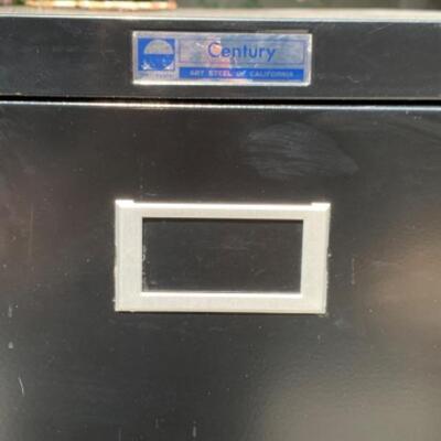 66.  Black 4-drawer filing cabinet