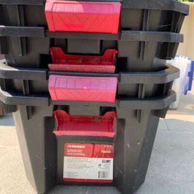 71.  Lot of 4 plastic storage containers