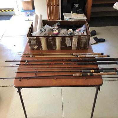 75.  Large collection of fishing gear:  poles, reels, lures, hooks, waders, etc.