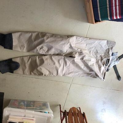 75.  Large collection of fishing gear:  poles, reels, lures, hooks, waders, etc.