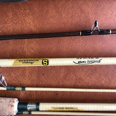 75.  Large collection of fishing gear:  poles, reels, lures, hooks, waders, etc.