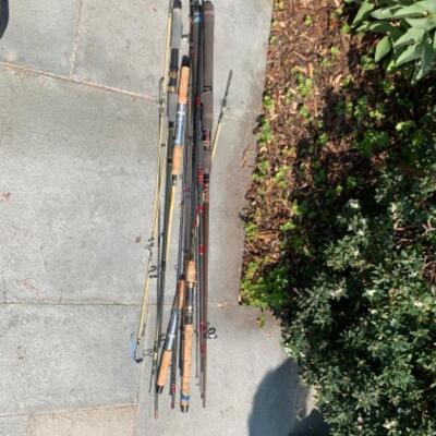 75.  Large collection of fishing gear:  poles, reels, lures, hooks, waders, etc.
