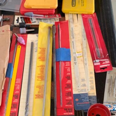 85.  Drill bits, assortment of saws and saw blades