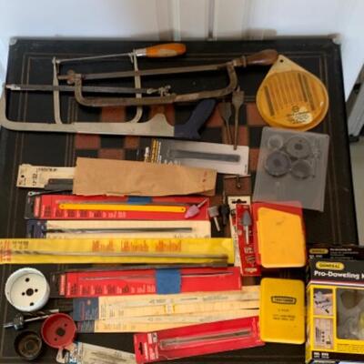 85.  Drill bits, assortment of saws and saw blades