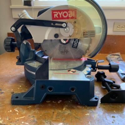 91.  Unused Ryobi chop saw