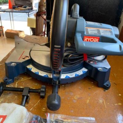 91.  Unused Ryobi chop saw