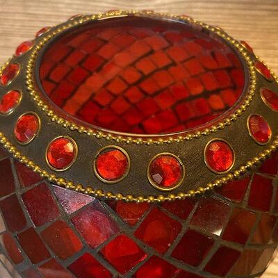 W54: Painting, Candle Jar, and Vintage Book