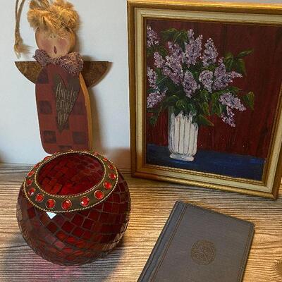 W54: Painting, Candle Jar, and Vintage Book