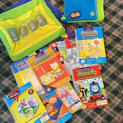 P109: Leap Frog Leap Pad w/Books & Cartridges