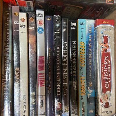 P124:  Lot of DVDs, Blu-ray's, and VHS