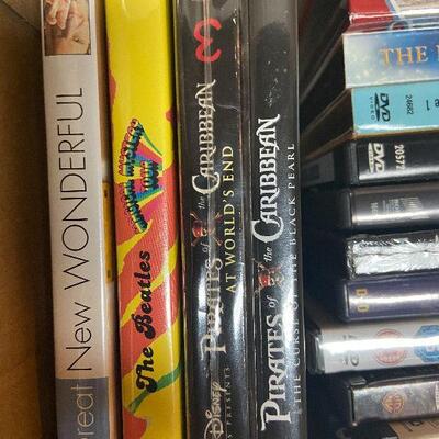 P124:  Lot of DVDs, Blu-ray's, and VHS