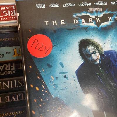 P124:  Lot of DVDs, Blu-ray's, and VHS