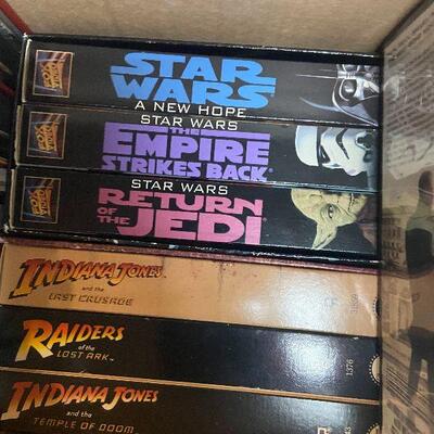 P124:  Lot of DVDs, Blu-ray's, and VHS