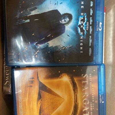 P124:  Lot of DVDs, Blu-ray's, and VHS