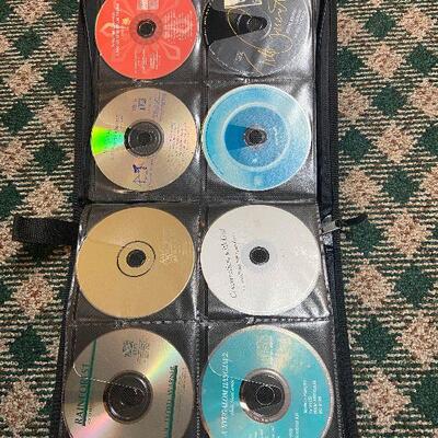 P129:  Variety of CD's, Cases