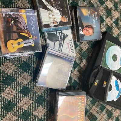 P129:  Variety of CD's, Cases