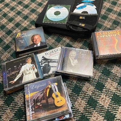 P129:  Variety of CD's, Cases