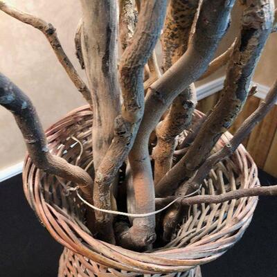 #15 Basket of sticks with a bird nest.