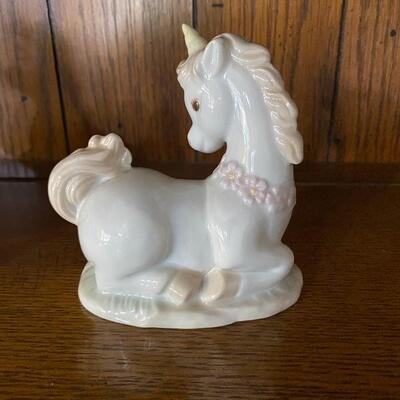 Three Unicorn Figurines