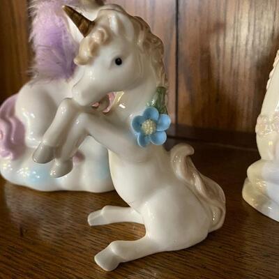 Three Unicorn Figurines