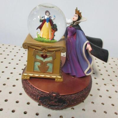Lot 46 - Disney Villains Evil Queen Crystal Ball Snow White Spinning Snow Globe