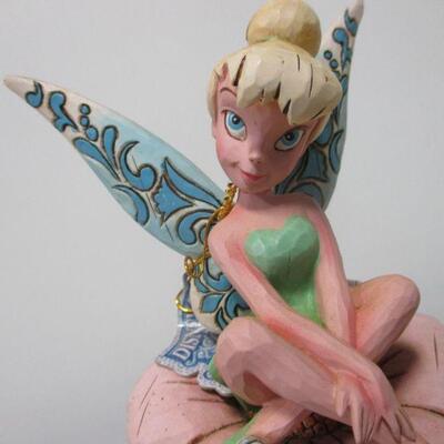 Lot 73 - Enesco Walt Disney Sitting Pretty Peter Pan Tinker Bell Figure