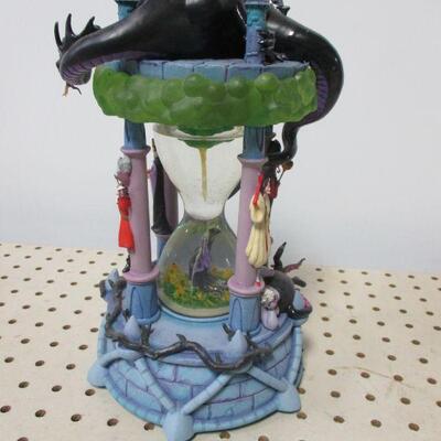 Lot 79 - Disney  Hourglass Snow Globe - Villains w/Maleficent Jafar Ursula